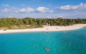 Partez en Maldives. Restez dans un superbe hôtel Meeru Island Resort & Spa.