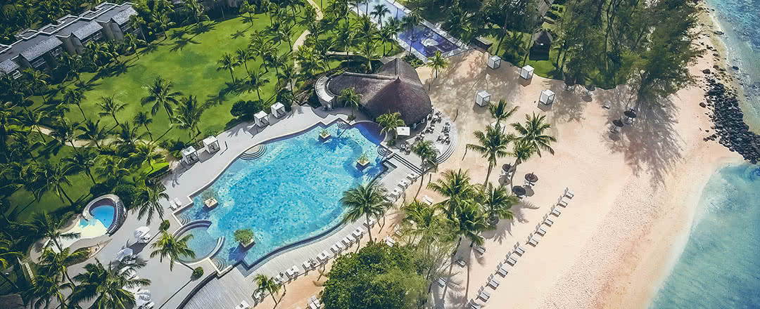 Partez en Ile Maurice. Restez dans un superbe hôtel Hôtel Outrigger Mauritius Beach Resort.